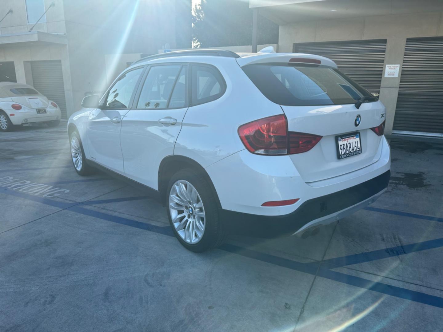 2014 WHITE /Black BMW X1 Leather (WBAVL1C56EV) with an 4 Cylinders engine, AUTOMATIC transmission, located at 30 S. Berkeley Avenue, Pasadena, CA, 91107, (626) 248-7567, 34.145447, -118.109398 - Don't let bad credit or financial setbacks hold you back from owning a luxury SUV like the 2014 BMW X1 xDrive28i. At our BHPH dealership, we're here to make the car-buying process as smooth and stress-free as possible. We invite you to visit our dealership in Pasadena, CA, to explore our inventory o - Photo#2